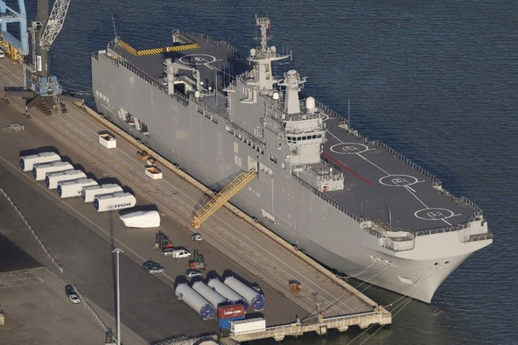 An aerial view shows the Mistral-class helicopter carrier Vladivostok constructed for Russia at the STX Les Chantiers de l'Atlantique shipyard site in the port of Montoir-de-Bretagne near Saint Nazaire, western France, September 22, 2014. REUTERS/Ste