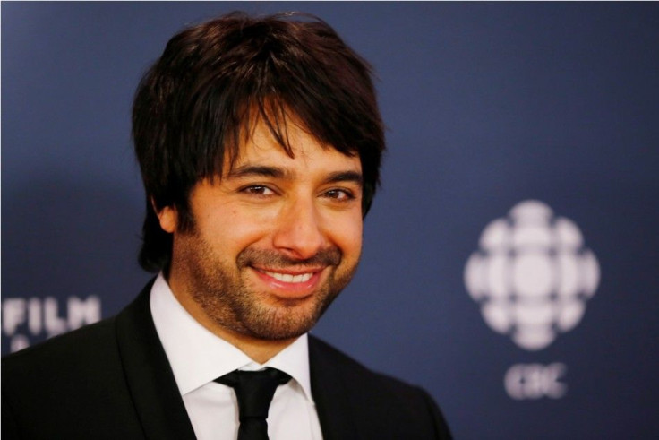 CBC personality Jian Ghomeshi arrives on the red carpet at the 2014 Canadian Screen awards