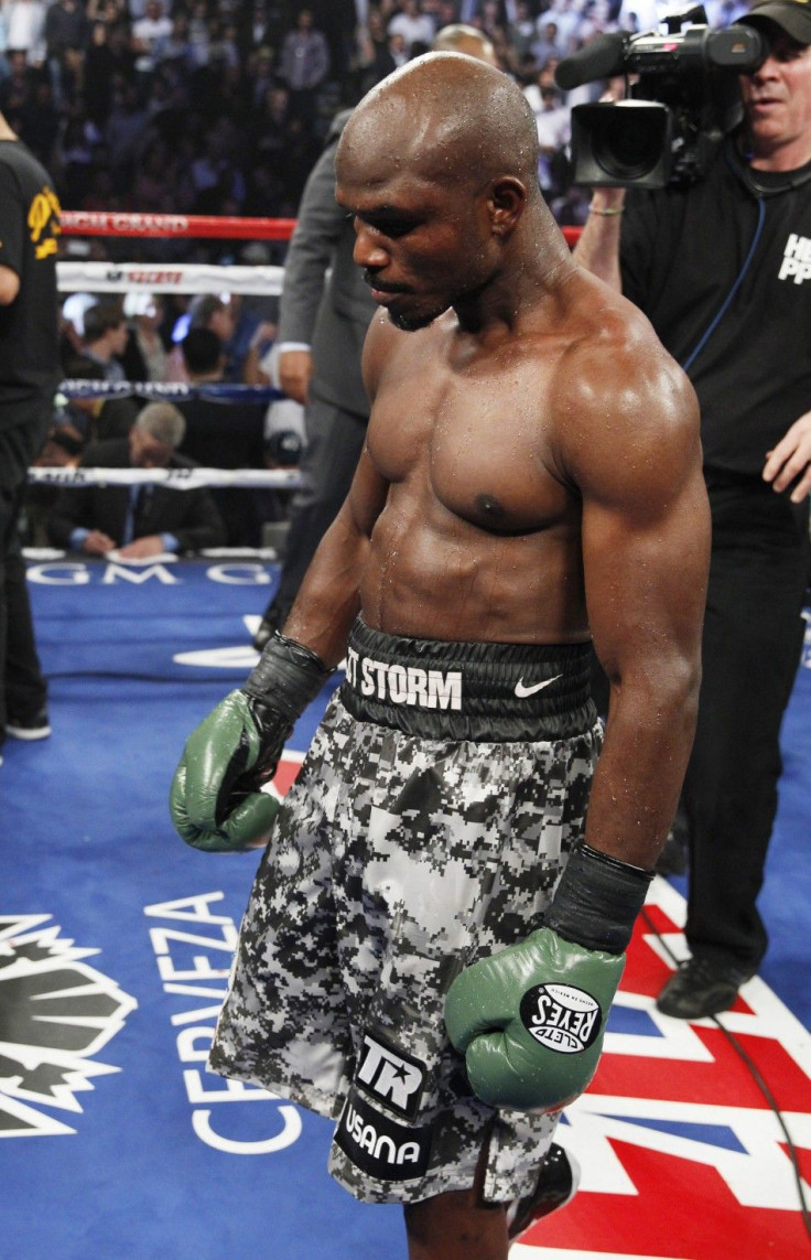 WBO welterweight champion Timothy Bradley of the U.S. hangs his head after losing a unanimous decision to Manny Pacquiao of the Philippines after their title fight at the MGM Grand Garden Arena in Las Vegas, Nevada April 12, 2014. REUTERS/Steve Marcus