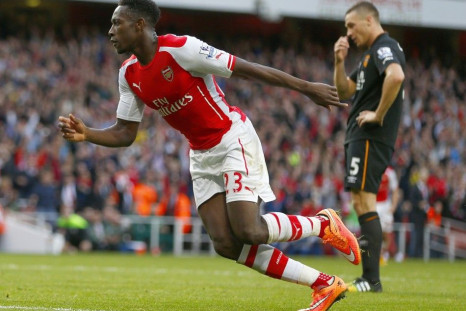 Arsenal's Danny Welbeck celebrates after scoring a goal against Hull during their English Premier League soccer match at the Emirates stadium in London October 18, 2014.
