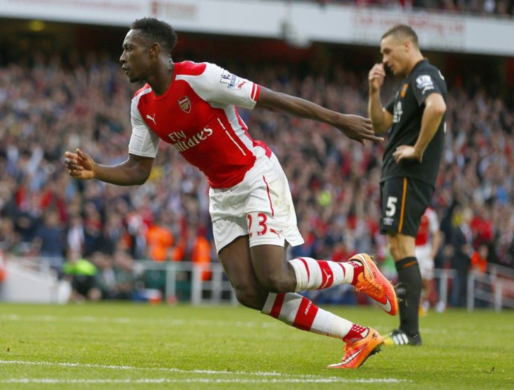 Arsenal's Danny Welbeck celebrates after scoring a goal against Hull during their English Premier League soccer match at the Emirates stadium in London October 18, 2014.