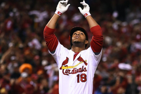 Oct 12, 2014; St. Louis, MO, USA; St. Louis Cardinals pinch hitter Oscar Taveras (18) celebrates after hitting a solo home run against the San Francisco Giants during the 7th inning in game two of the 2014 NLCS playoff baseball game at Busch Stadium.
