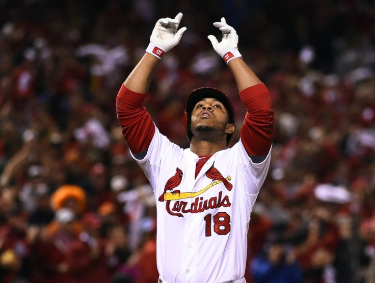 Oct 12, 2014; St. Louis, MO, USA; St. Louis Cardinals pinch hitter Oscar Taveras (18) celebrates after hitting a solo home run against the San Francisco Giants during the 7th inning in game two of the 2014 NLCS playoff baseball game at Busch Stadium.