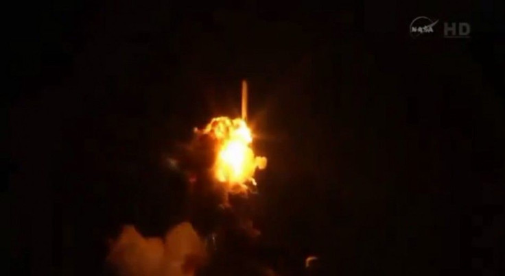 An unmanned Antares rocket is seen exploding seconds after lift off