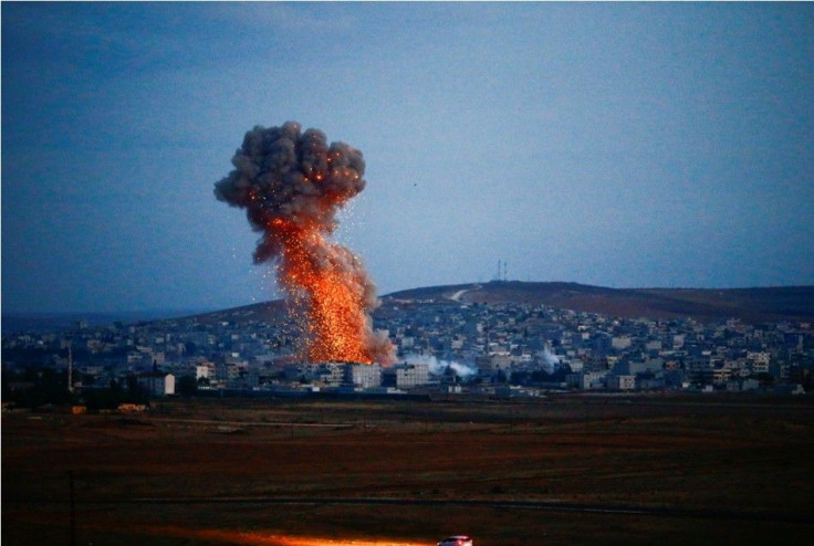 Smoke rises over Syrian town of Kobani after an airstrike