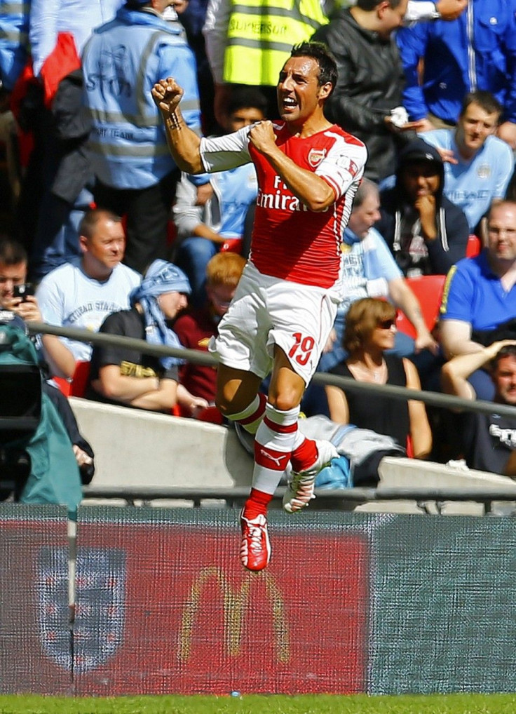 Arsenal's Santi Cazorla celebrates after scoring the opening goal during their English Community Shield soccer match against Manchester City at Wembley Stadium in London, August 10, 2014.