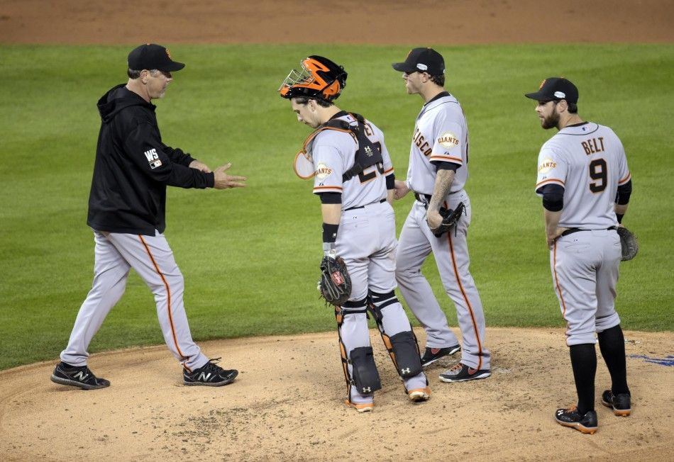 San Francisco Giants starting pitcher Jake Peavy is relieved by manager Bruce Bochy 