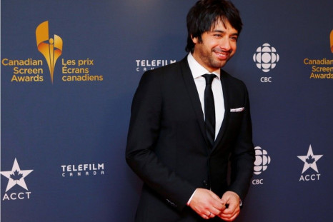 CBC personality Jian Ghomeshi arrives on the red carpet at the 2014 Canadian Screen awards in Toronto