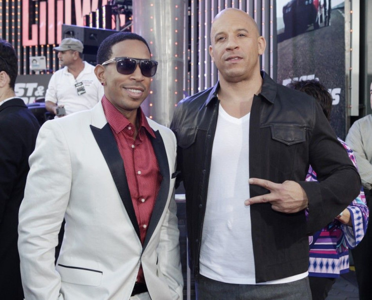 Cast member and producer Vin Diesel (R) poses with cast member Chris &quot;Ludacris&quot; Bridges at the premiere of the new film, &quot;Fast & Furious 6&quot;