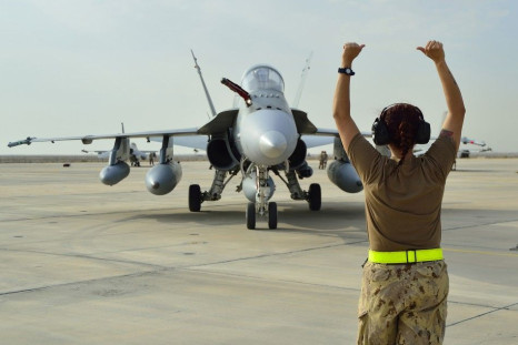A Canadian Armed Forces CF-18 Fighter jet arrives at the Canadian Air Task Force Flight Operations Area in Kuwait on October 28, 2014 in this Canadian Forces handout photo received October 29, 2014. The jets are part of the Canadian Armed Forces&#039; con