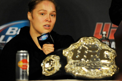 Feb 22, 2014; Las Vegas, NV, USA; UFC women's bantamweight champion Ronda Rousey answers questions from reporters after defending her title against Sara McMann in the first round of the main event of UFC 170 at Mandalay Bay