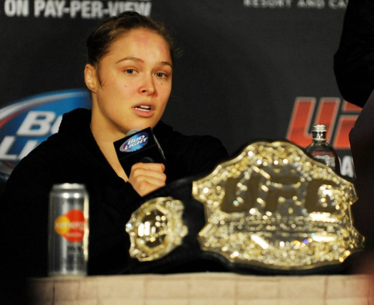Feb 22, 2014; Las Vegas, NV, USA; UFC women's bantamweight champion Ronda Rousey answers questions from reporters after defending her title against Sara McMann in the first round of the main event of UFC 170 at Mandalay Bay