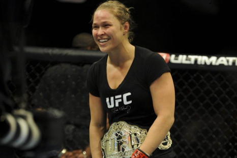Feb 22, 2014; Las Vegas, NV, USA; Ronda Rousey reacts after defeating Sara McMann (not pictured) in their UFC bantamweight championship bout at Mandalay Bay.