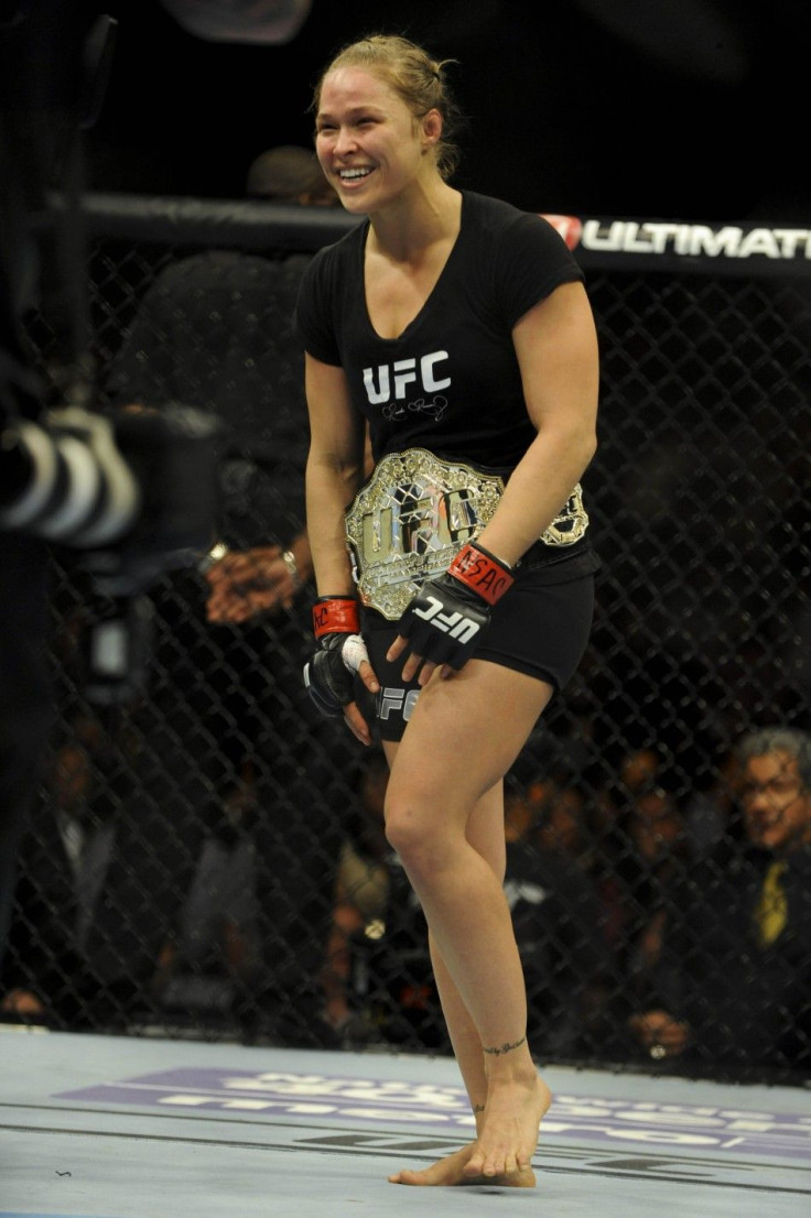 Feb 22, 2014; Las Vegas, NV, USA; Ronda Rousey reacts after defeating Sara McMann (not pictured) in their UFC bantamweight championship bout at Mandalay Bay.