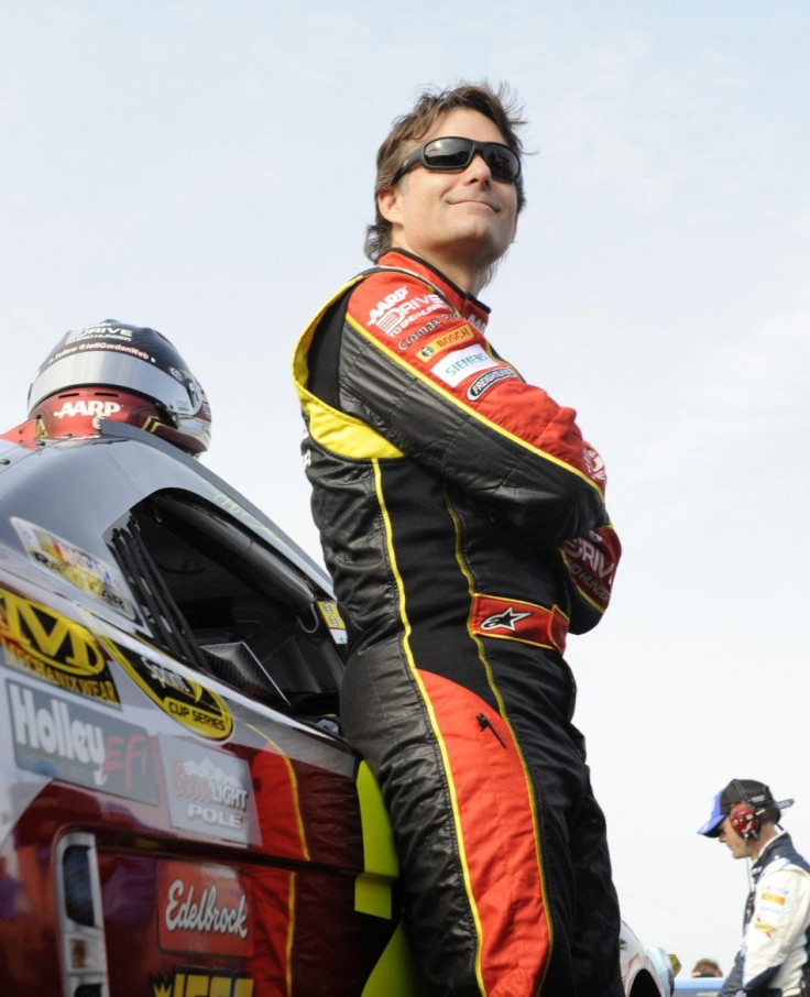 Jeff Gordon stands next to his number 24 Chevrolet before the start of the second NASCAR Sprint Cup Series Budweiser Duel at the Daytona International Speedway in Daytona Beach, Florida February 21, 2013. The two Duel races determine starting positions fo