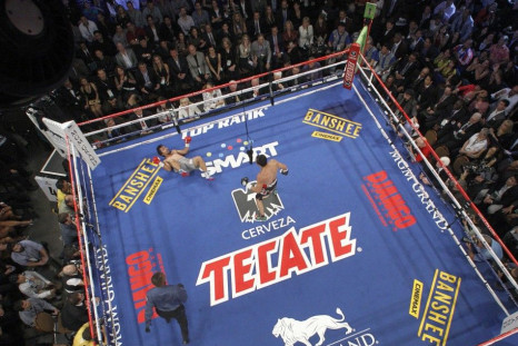 Manny Pacquiao of the Philippines is knocked down by Juan Manuel Marquez