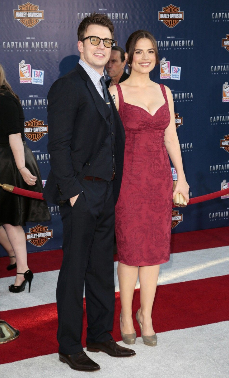 Cast Members Chris Evans, Left, And Hayley Atwell Pose As They Arrive At The &#039;Captain America: The First Avenger&#039; Film Premiere.