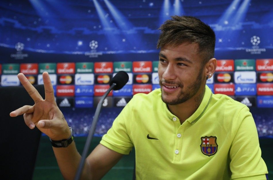 Barcelonas Neymar gestures during a news conference at Joan Gamper training camp, near Barcelona October 20, 2014. FC Barcelona and Ajax will play their Champions league soccer match on Tuesday. 