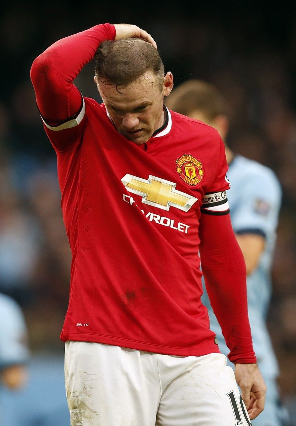 Manchester Uniteds Wayne Rooney reacts during their English Premier League soccer match against Manchester City at the Etihad Stadium in Manchester, northern England November 2, 2014. 