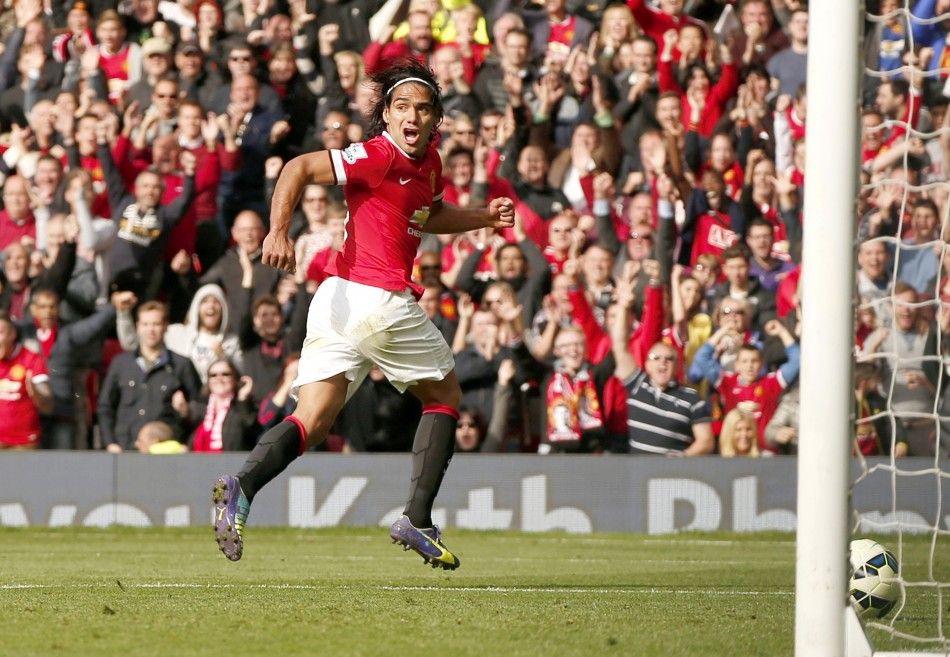 Manchester Uniteds Radamel Falcao celebrates after scoring a goal against Everton during their English Premier League soccer match at Old Trafford in Manchester, northern England October 5, 2014. 