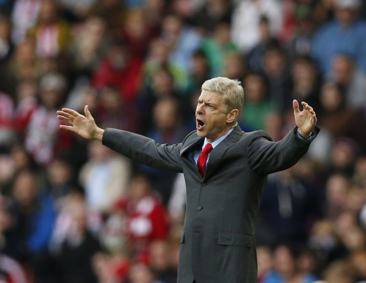 Arsenal manager Arsene Wenger gestures during their English Premier League soccer match against Sunderland at the Stadium of Light in Sunderland, northern England October 25, 2014.