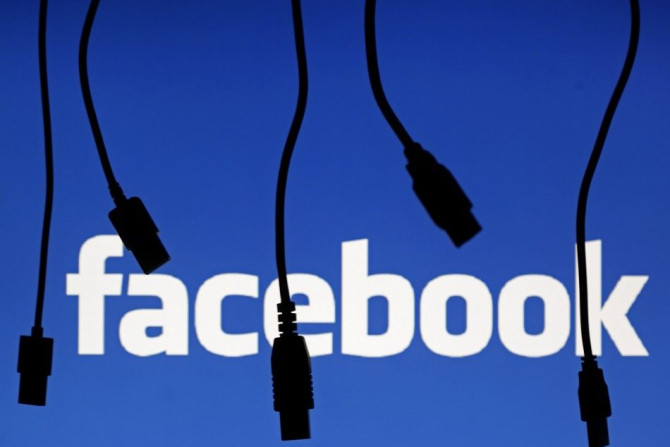Electronic cables are silhouetted next to the logo of Facebook