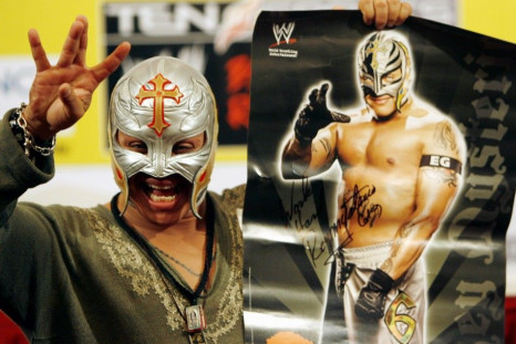 World Wrestling entertainer Rey Mysterio from the U.S. waves during a function in Mumbai March 13, 2007. Rey is in the city to promote wrestling and meet fans.