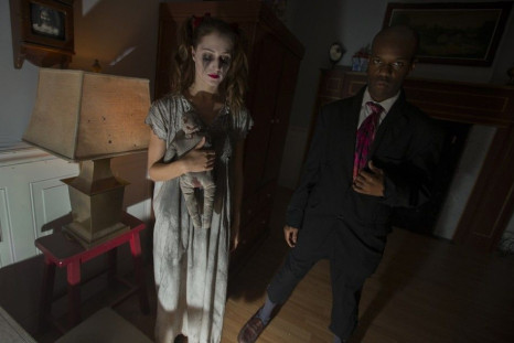Actors depicting the legends of ghosts living inside New York's landmark Dakota apartment building are seen inside Nightmare: New York, a haunted house for adults, in New York October 22, 2014. With Hollywood-grade stagecraft and professional actors, haun