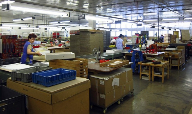 Employees work at a factory run by PIKO, a model railway manufacturer, in the eastern German town of Sonneberg, October 9, 2014. The small town fell into crisis when East and West Germany reunified but an influx of new firms has helped its economy grow mo