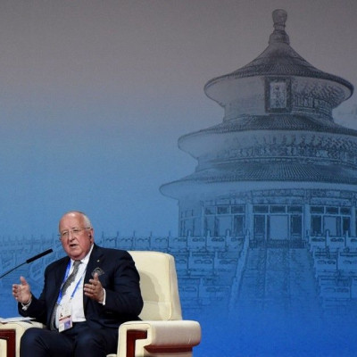 Sam Walsh, chief executive of mining giant Rio Tinto, takes part in a summit dialogue at the APEC CEO Summit at the China National Convention Centre (CNCC) in Beijing November 9, 2014, part of the Asia-Pacific Economic Cooperation (APEC) Summit.
