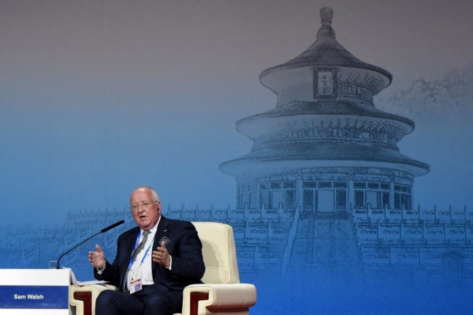 Sam Walsh, chief executive of mining giant Rio Tinto, takes part in a summit dialogue at the APEC CEO Summit at the China National Convention Centre (CNCC) in Beijing November 9, 2014, part of the Asia-Pacific Economic Cooperation (APEC) Summit.