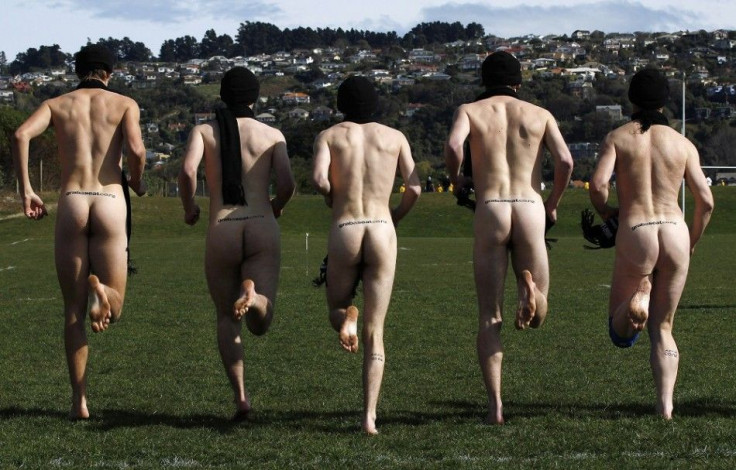 Naked rugby players of New Zealand's Nude Blacks practice before their match against Spain's Las Conquistadoras (The Conquerors) before the Rugby World Cup opening match between England and Argentina in Dunedin, September 10, 2011.