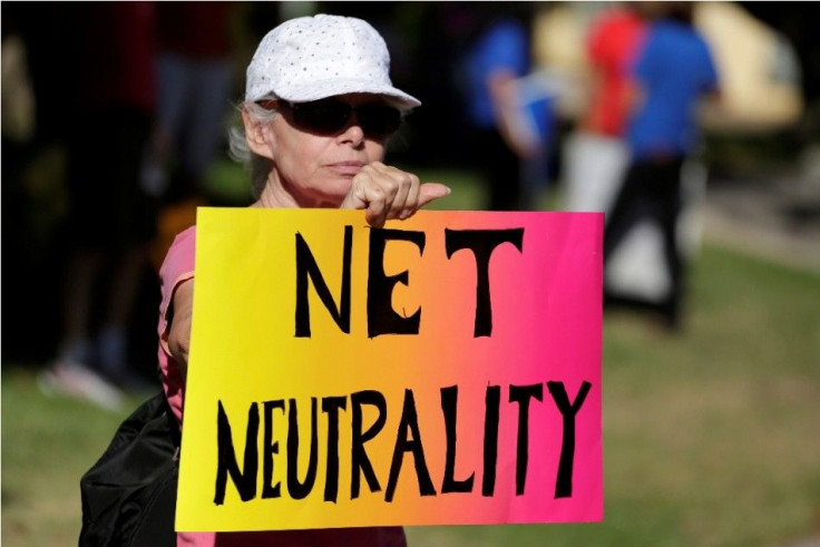 Lori Erlendsson attends a pro-net neutrality Internet activist rally in the neighborhood