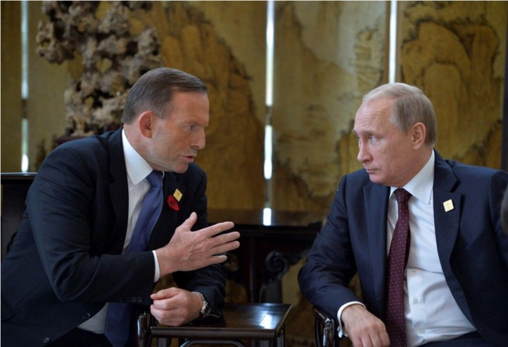 Russia&#039;s President Vladimir Putin (R) meets with Australia&#039;s Prime Minister Tony Abbott during the Asia Pacific Economic Cooperation (APEC) Summit in Beijing