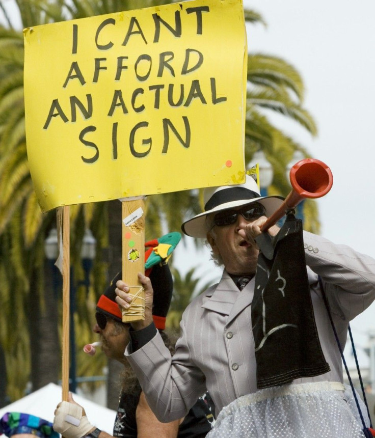 A member of the First Church of the Last Laugh blows a horn while marching in the 30th Annual St. Stupid&#039;s Day Parade down the streets of the financial district in San Francisco, California, April 1, 2008.