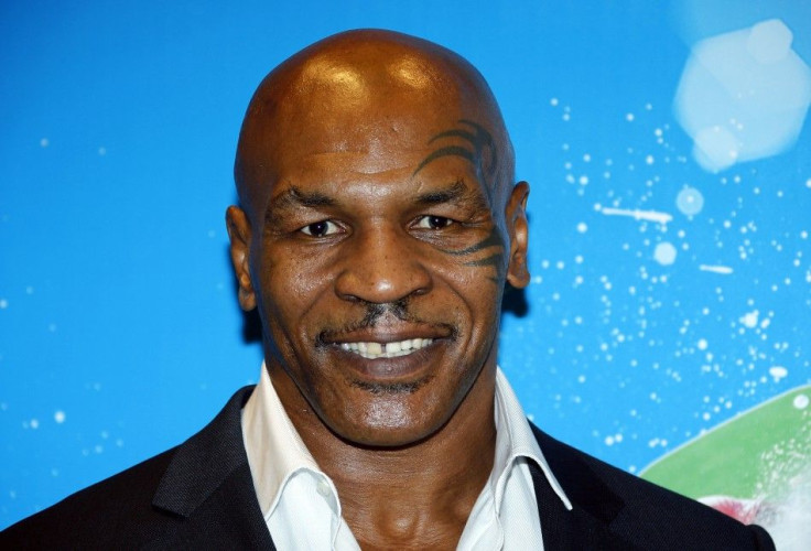 Former professional boxer Mike Tyson poses before receiving the Sportel Special Prize Autobiography for his book Undisputed Truth: My Autobiography during the Golden Podium Awards at the Sportel in Monte Carlo October 8, 2014. The Sportel trade show is th