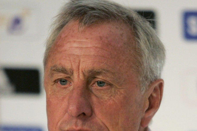 Retired football player Johan Cruyff listens during a news conference at the Omnilife stadium in Zapopan near Guadalajara October 27, 2012. Cruyff is a sporting consultant from Guadalajara Chivas, a popular football club in Mexico.