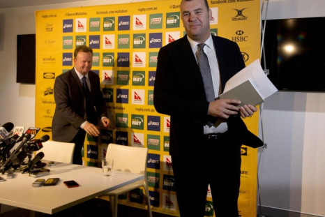 Michael Cheika (R) walks from a news conference where he was announced as the new Australian Wallabies Rugby Union team coach in Sydney October 22, 2014. Announcing the appointment was Australian Rugby Union chief executive Bill Pulver (L). Cheika was app