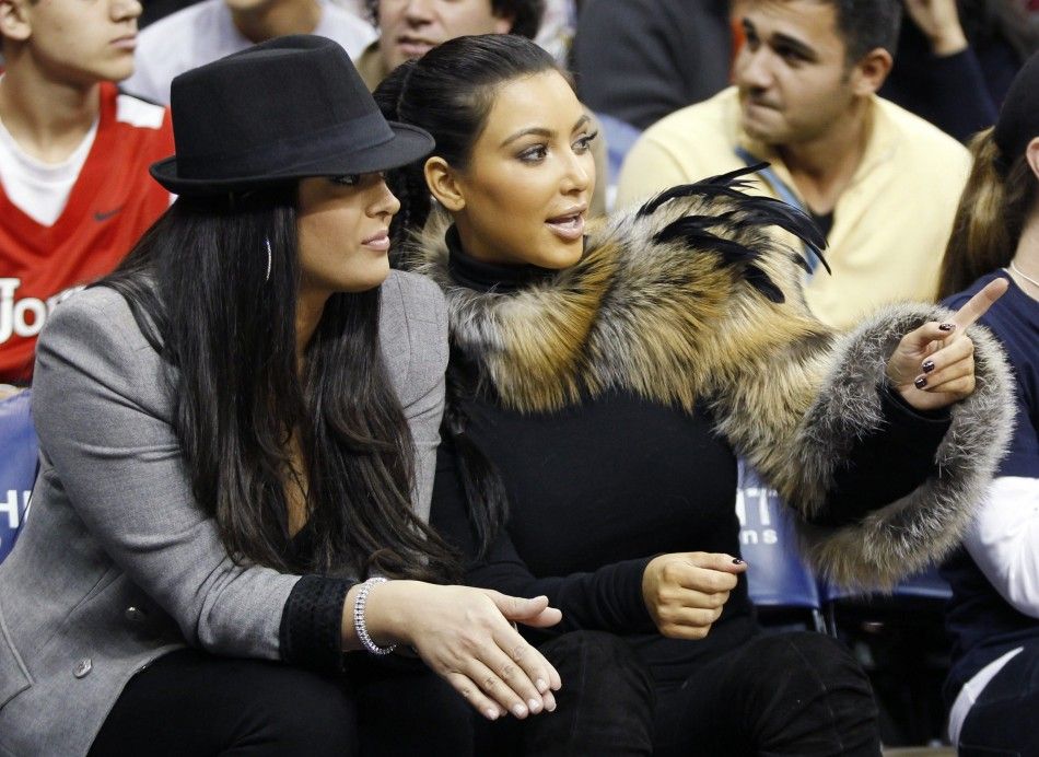 Reality television star Kim Kardashian watches the New Jersey Nets play