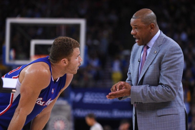 Los Angeles Clippers head coach Doc Rivers (right) instructs forward Blake Griffin
