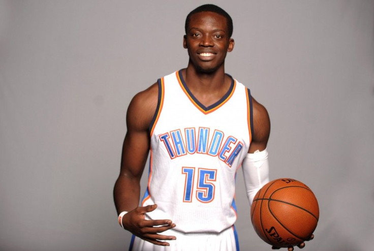 Sep 29, 2014; Oklahoma City, OK, USA; Oklahoma City Thunder guard Reggie Jackson (15) poses during media day at Chesapeake Energy Arena