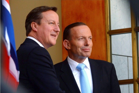 British Prime Minister David Cameron and Australian Prime Minister Tony Abbott attend at a joint news conference at Parliament House in Canberra