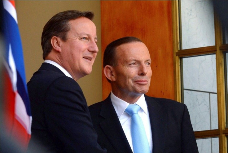 British Prime Minister David Cameron and Australian Prime Minister Tony Abbott attend at a joint news conference at Parliament House in Canberra
