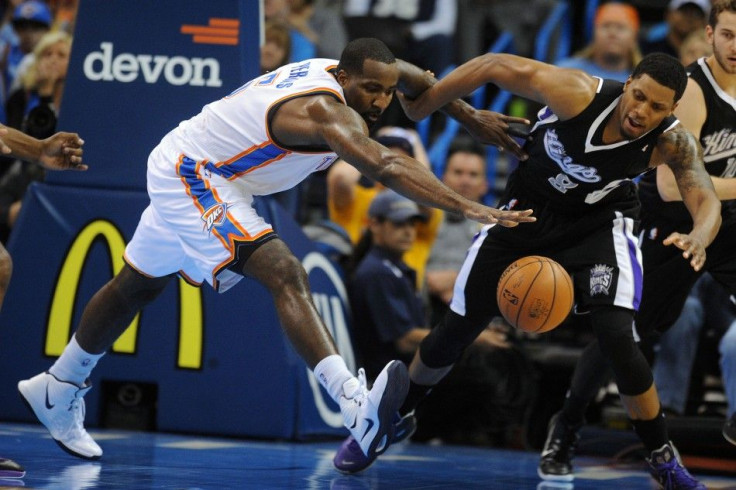 DATE IMPORTED:November 10, 2014Nov 9, 2014; Oklahoma City, OK, USA; Oklahoma City Thunder center Kendrick Perkins (5) fights for a loose ball against Sacramento Kings forward Rudy Gay (8) during the second quarter at Chesapeake Energy Arena.