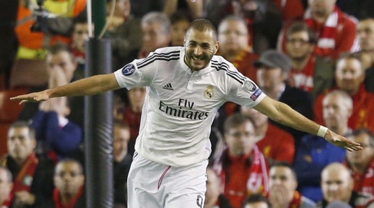Real Madrid's Karim Benzema celebrates after scoring the second goal against Liverpool during their Champions League Group B soccer match at Anfield in Liverpool, northern England October 22, 2014.