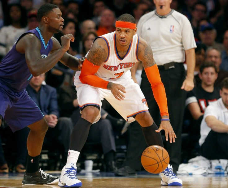 New York Knicks forward Carmelo Anthony (7) works against Charlotte Hornets guard Lance Stephenson (1) during the first half at Madison Square Garden.