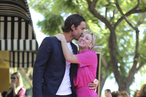 Actress Kaley Cuoco is kissed by her husband Ryan Sweeting at the dedication of her star on the Hollywood Walk of Fame in Los Angeles, California 