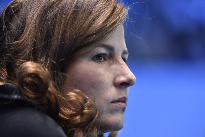 Mirka Federer watches her husband Roger Federer of Switzerland play his semi-final tennis match against compatriot Stanislas Wawrinka at the ATP World Tour Finals at the O2 Arena in London November 15, 2014. REUTERS/Toby Melville