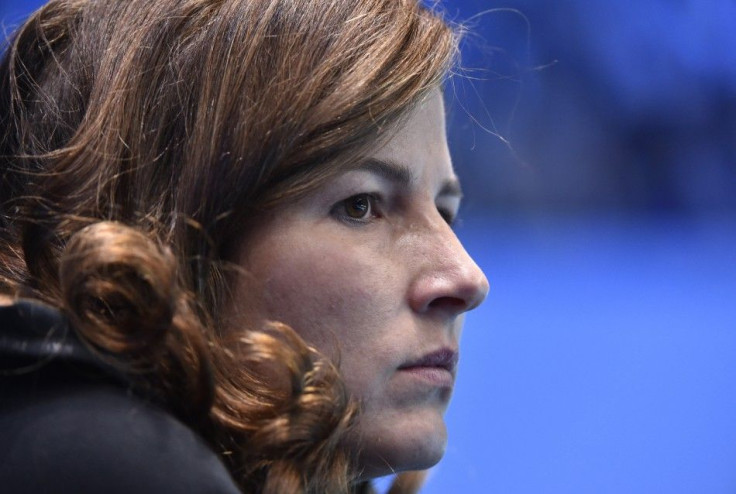 Mirka Federer watches her husband Roger Federer of Switzerland play his semi-final tennis match against compatriot Stanislas Wawrinka at the ATP World Tour Finals at the O2 Arena in London November 15, 2014. REUTERS/Toby Melville