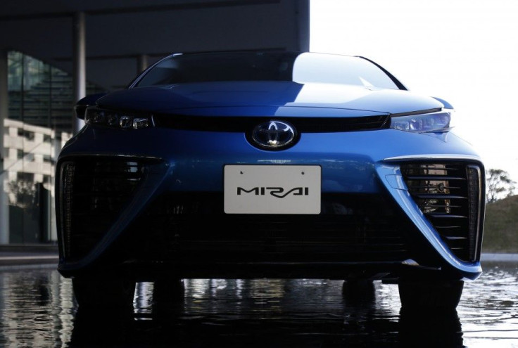 Toyota Motor Corp&#039;s new hydrogen fuel cell vehicle (FCV) sedan car &quot;Mirai&quot;, meaning &quot;future&quot; in Japanese, is displayed during an unveiling event at the Miraikan National Museum of Emerging Science and Innovation in Tokyo, November